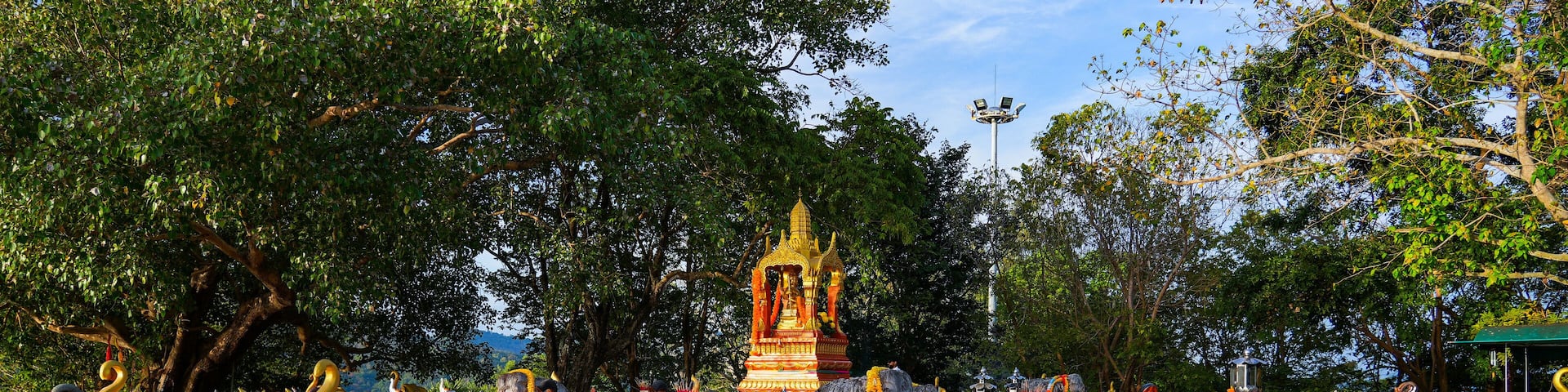 Statues of elephant deities arranged in a circle on Phra Phrom Square on Promthep Cape, the southernmost point of Phuket island in the Andaman Sea, Thailand, Southeast Asia
