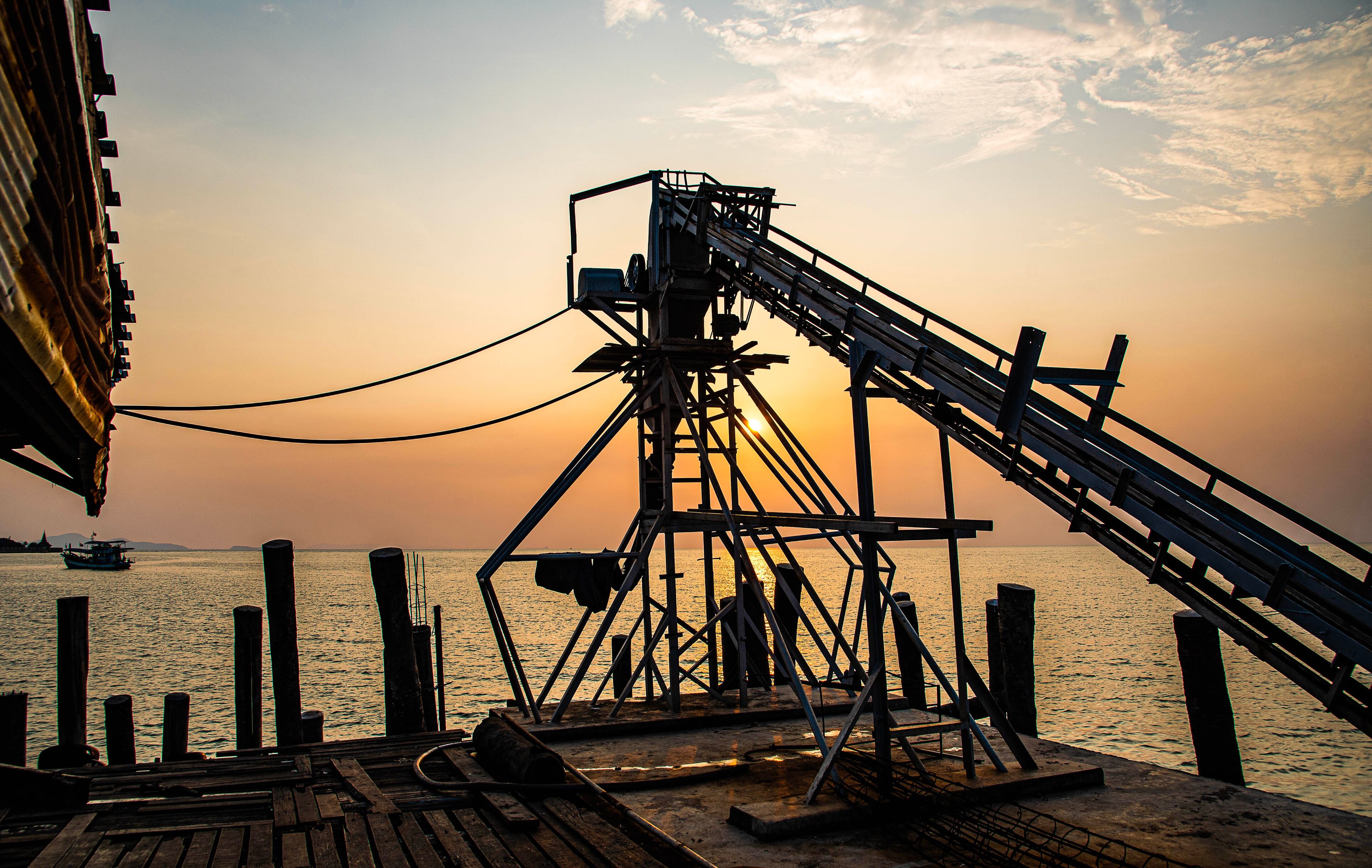 In the evening at a local fishing boat pier called Saphan Pla at Ban Na Kluea, Bang Lamung District, Thailand, April 20, 2022