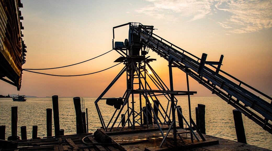 In the evening at a local fishing boat pier called Saphan Pla at Ban Na Kluea, Bang Lamung District, Thailand, April 20, 2022
