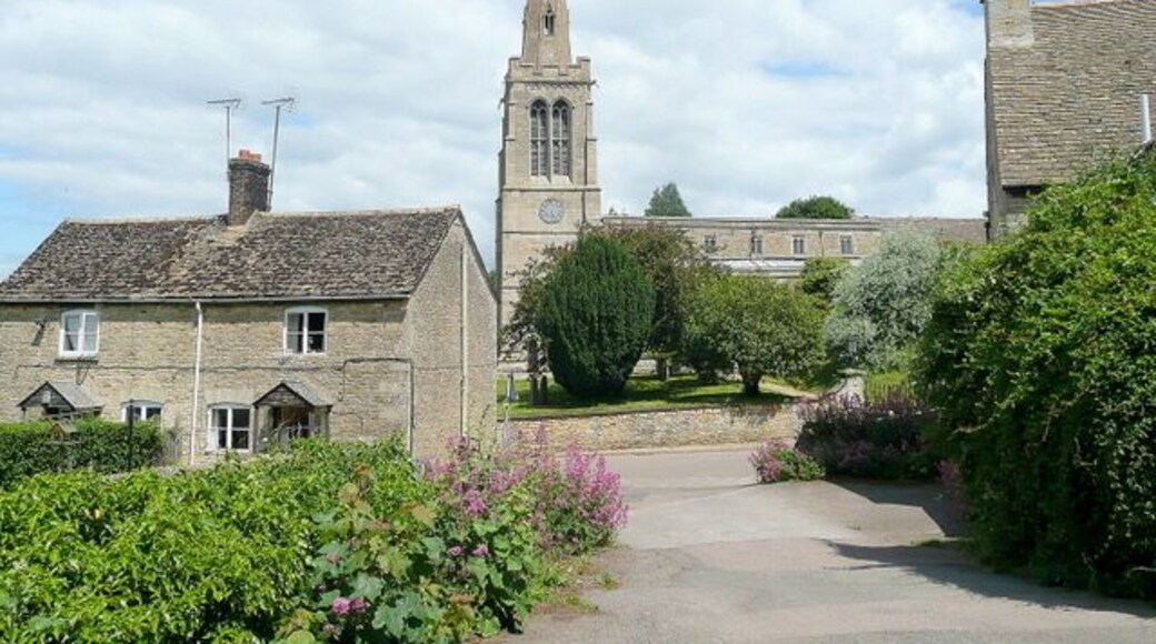 View north from the car park of the Queen's Head pub, Main Street, Bulwick, Northamptonshire, to St Nicholas' parish church