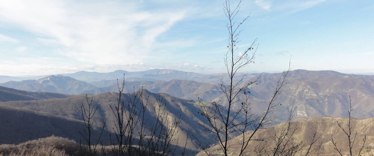 A mountainous landscape with a clear sky.