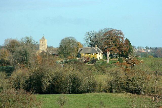 Farleigh Hungerford Church This view of Farleigh Hungerford Church and nearby cottages neatly falls into two grid squares so I have left it where it was taken.