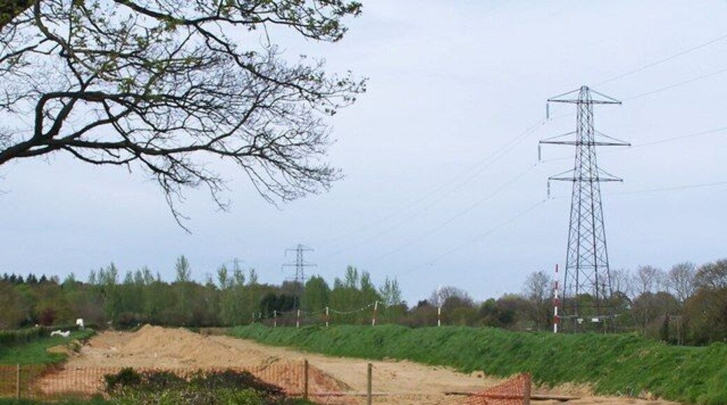 Gas pipeline works alongside power lines This is the reinstatement stage following construction of the Lockerley to Marchwood gas pipeline. It here runs between the lane and the power lines.