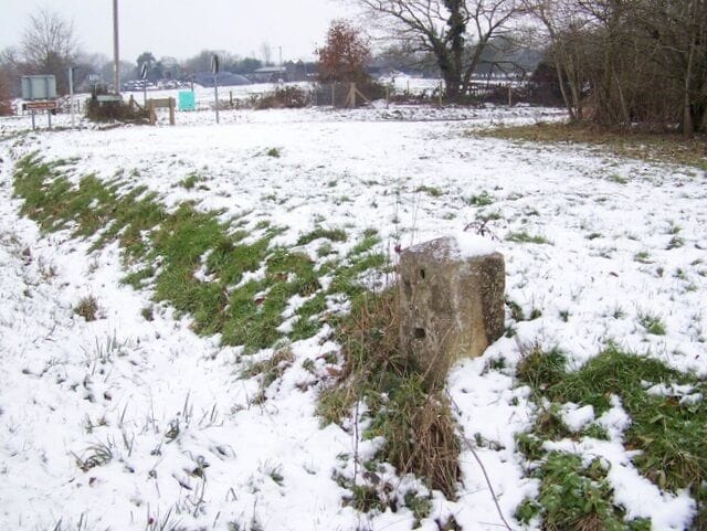 Milestone, Sherfield English The milestone is beside the A27, Romsey Road. It is missing its mileage plate.