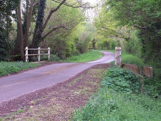 Bridge over stream at Dandy's Ford The remains of the ford are to the right of the photo, very overgrown. This scene is typical of the area with many small lanes and streams.