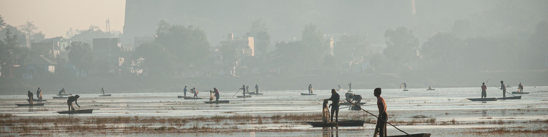 Fishermen catching fish at lake in Dhar city of madhya pradesh state. India.