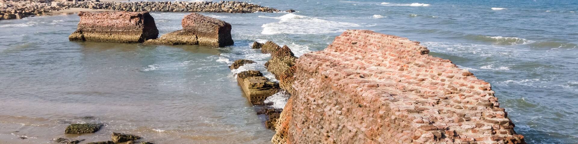 The ruins of the walls of Fort Dansborg leading to the sea in the ancient Danish colony of Tranquebar.