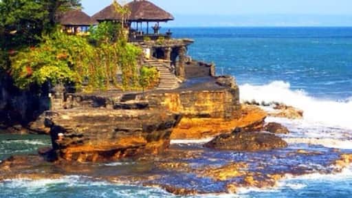 Tanah Lot is a Hindu Temple set on a big rock surrounded by the seawater located in Tabanan, west part of #Bali. Sunset here is worth going for.