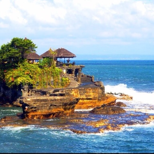 Tanah Lot is a Hindu Temple set on a big rock surrounded by the seawater located in Tabanan, west part of #Bali. Sunset here is worth going for.
