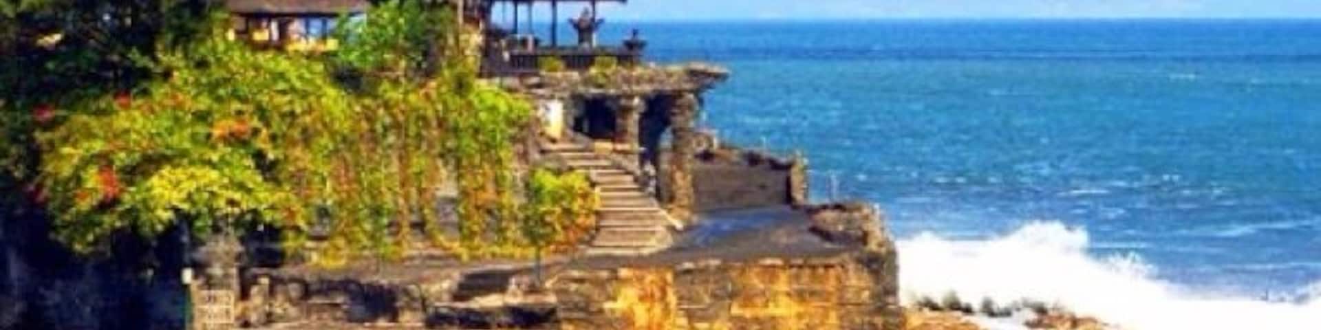 Tanah Lot is a Hindu Temple set on a big rock surrounded by the seawater located in Tabanan, west part of #Bali. Sunset here is worth going for.