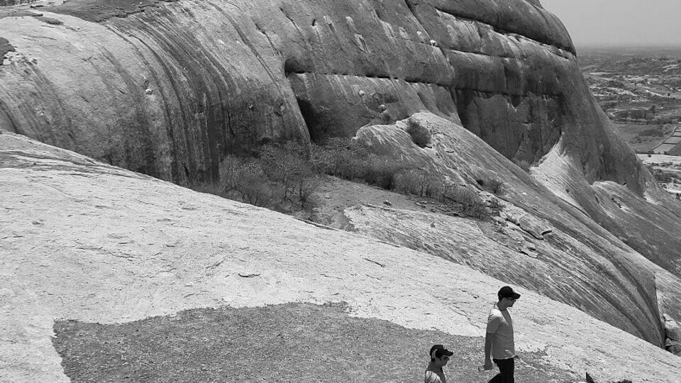 April 2012
Bhongir fort
Bhongir or Bhuvanagiri fort is located ca. 50 km east from Hyderabad. Built in 12th century by local ruler Tribhuvanamahalla (hence the name Bhuvanagiri) Vikramaditya s on a vast egg-shaped monolithic rock rising 150 metres above terrain. Fortified by nature (shape of the rock) and by men (moats, walls, gates at the foot) it was almost unbreakable. Bala Hisar pavilon on top was built by Qutbshahi rulers of Golkonda kingdom (Hyderabad) in 17th century and it gives truly birdview perspective of the surrounding land and Bhongir town bellow. Beware to go up the rock soon after sunrise or before sunset as the stone gets hot during the day making the hike much more demanding.
