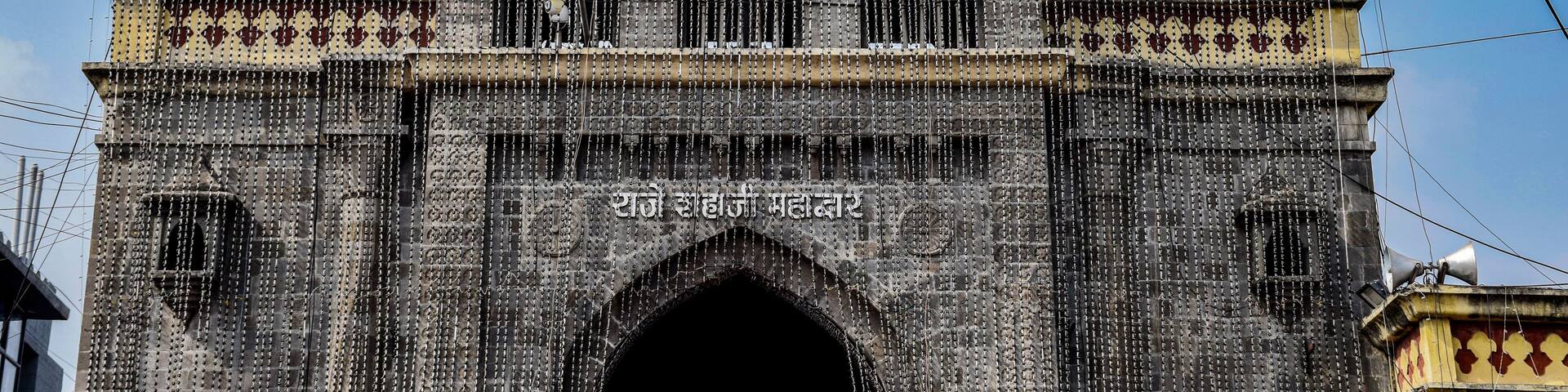 Picture of front view of a ancient temple constructed using black granite stone