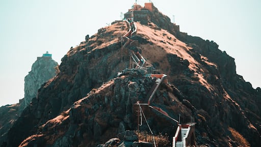 View of the Gorkhnath temple as seen from Ambaji Temple at the top of Mount Girnar in Junagadh, Gujarat, India