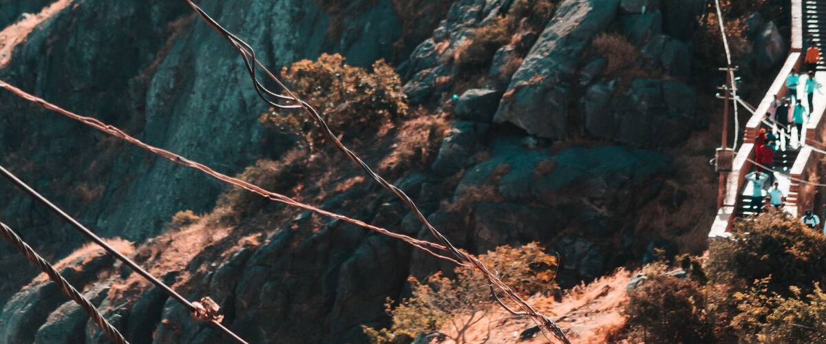 View of the Gorkhnath temple as seen from Ambaji Temple at the top of Mount Girnar in Junagadh, Gujarat, India