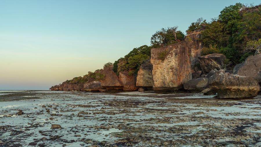 Interesting cliffs on a low tide in the evening at the beach. Sabu island, Indonesia