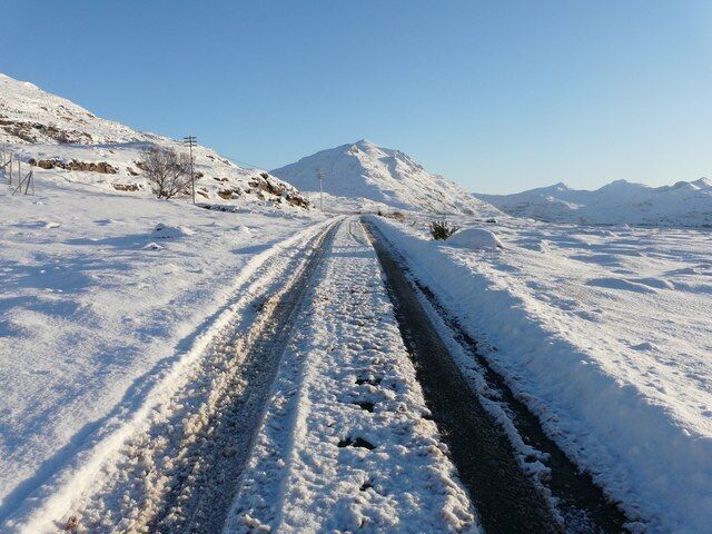 Heading East to Liathach A beautiful winters day looking east along the road from Inveralligin to Torridon. The road was still only passable with care with the village of Inveralligin still only accessible by 4wd vehicles. The magnificent munro of Liathach is in the centre of the photo.