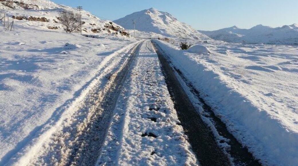 Heading East to Liathach A beautiful winters day looking east along the road from Inveralligin to Torridon. The road was still only passable with care with the village of Inveralligin still only accessible by 4wd vehicles. The magnificent munro of Liathach is in the centre of the photo.