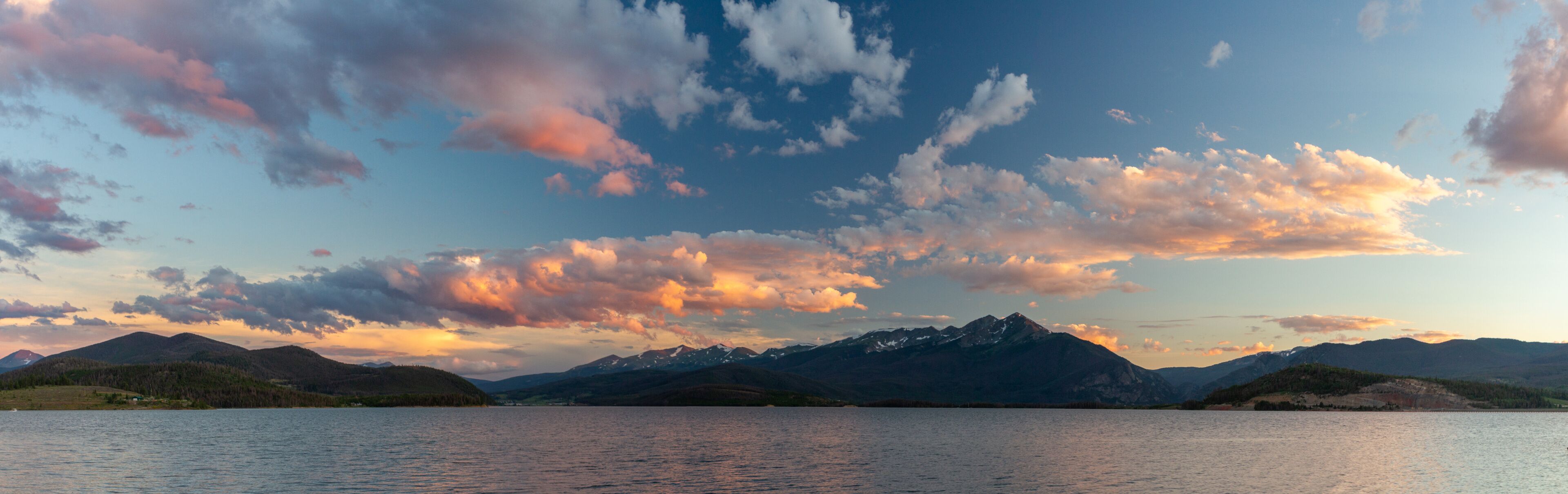 A panorama of sunset over the Rocky Mountains and Dillon Reservoir (Lake Dillon) in Colorado