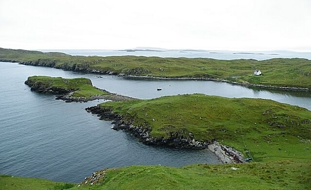 Stuaidh Peninsula From this viewpoint the whole of the peninsula can be seen, with Bàgh Bhorghasdail to the right and Loch Roghadail to the left. In the far distance, beyond the intervening skerries in the Sound of Harris, is the faint outline of the Isle of Skye on the horizon.