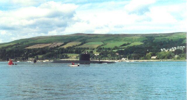 Rhu Narrows. HMS Revenge transits the Rhu Narrows as she departs the Gareloch for INDEX in the Clyde Submarine Exercise Areas. The red buoy to the left is the channel marker at the end of Limekiln Point.