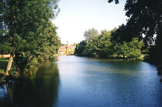 The lake at Birtsmorton Court View eastwards along the length of the lake with Birtsmorton Court in the distance. This forms part of the 19 acres of garden surrounding the moated grange.
