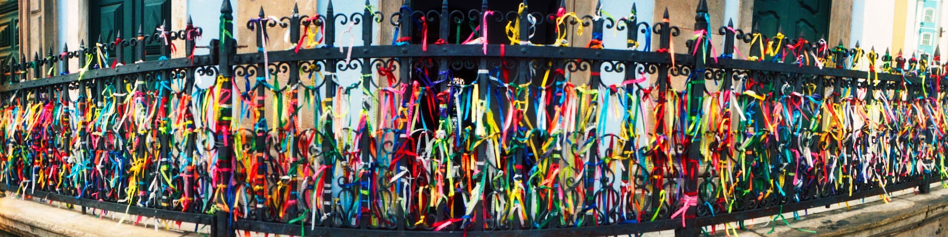 Colorful Bonfim wish ribbons tied around at Church of Nosso Senhor do Bonfim, Pelourinho, Salvador, Bahia, Brazil.