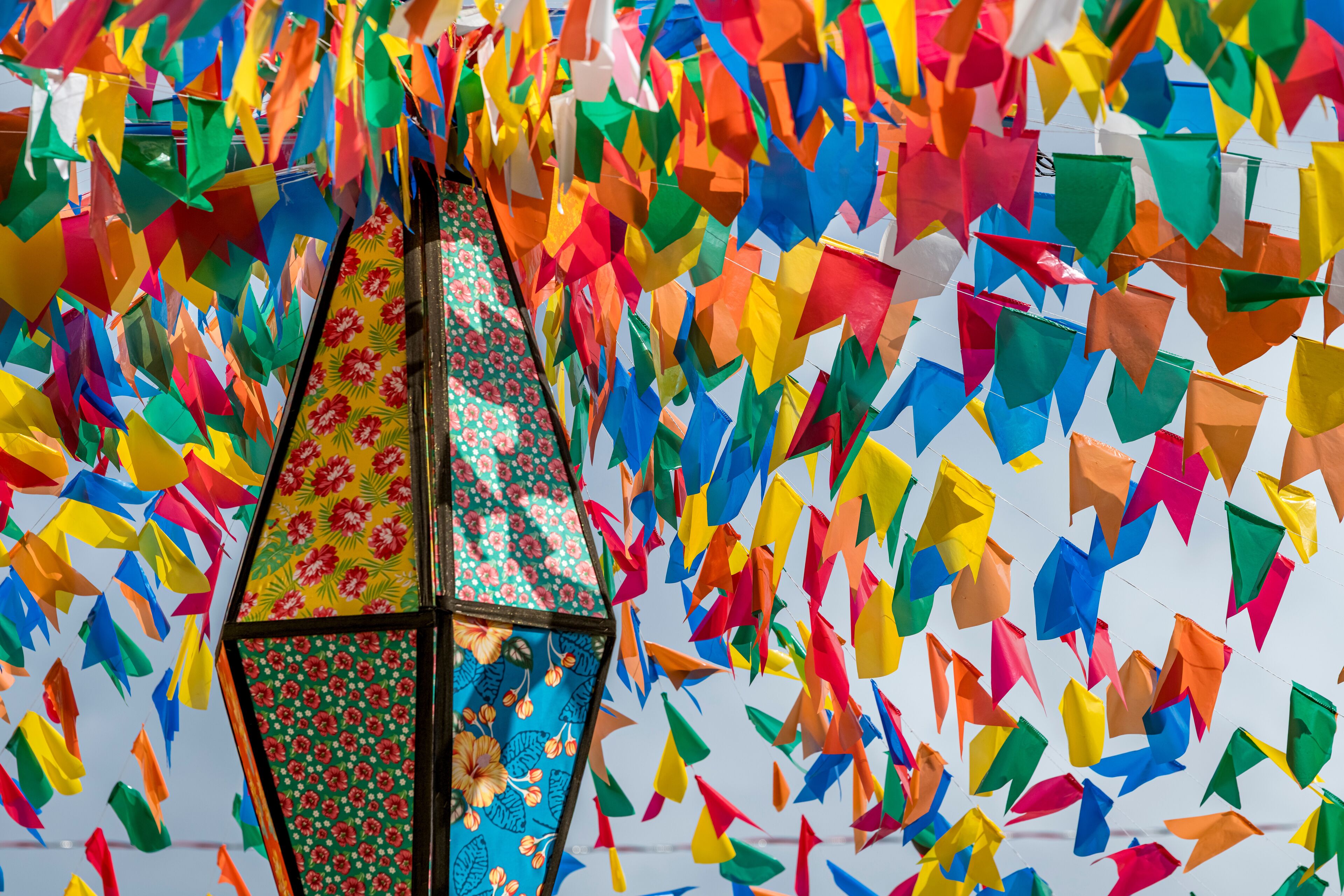 A colorful display of paper flags in various shapes and colors.