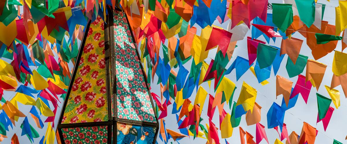 A colorful display of paper flags in various shapes and colors.
