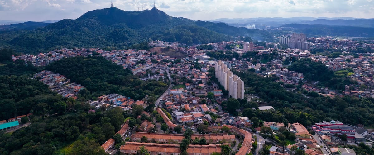Aerial view of the Pirituba neighborhood in Sao Paulo, Brazil. Pico do Jaraguá in the background.