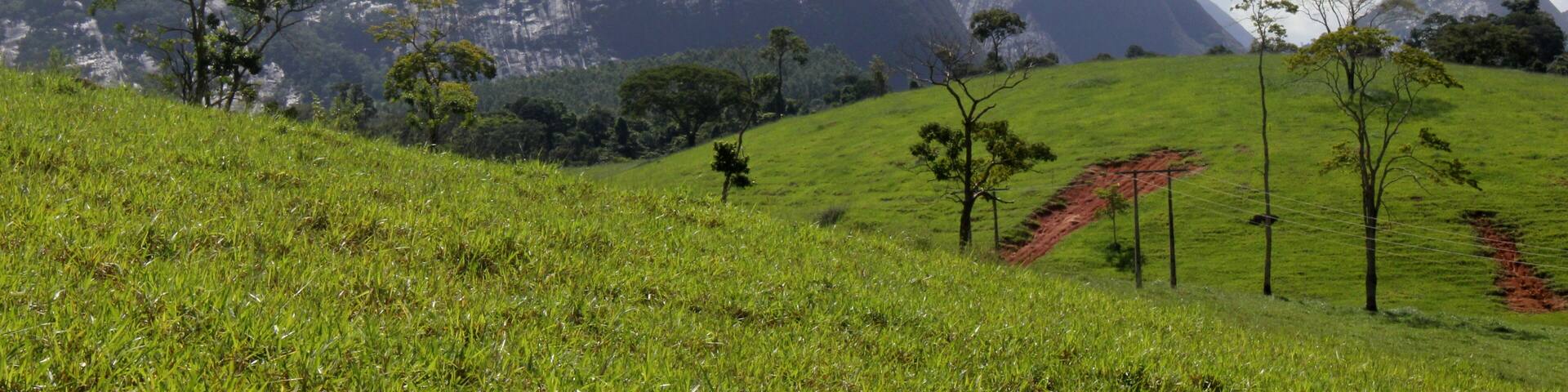 Rural scene in the municipality of Aguia Branca, Espirito Santo, Brazil, showing in the background the set of rocks known as three pontoons