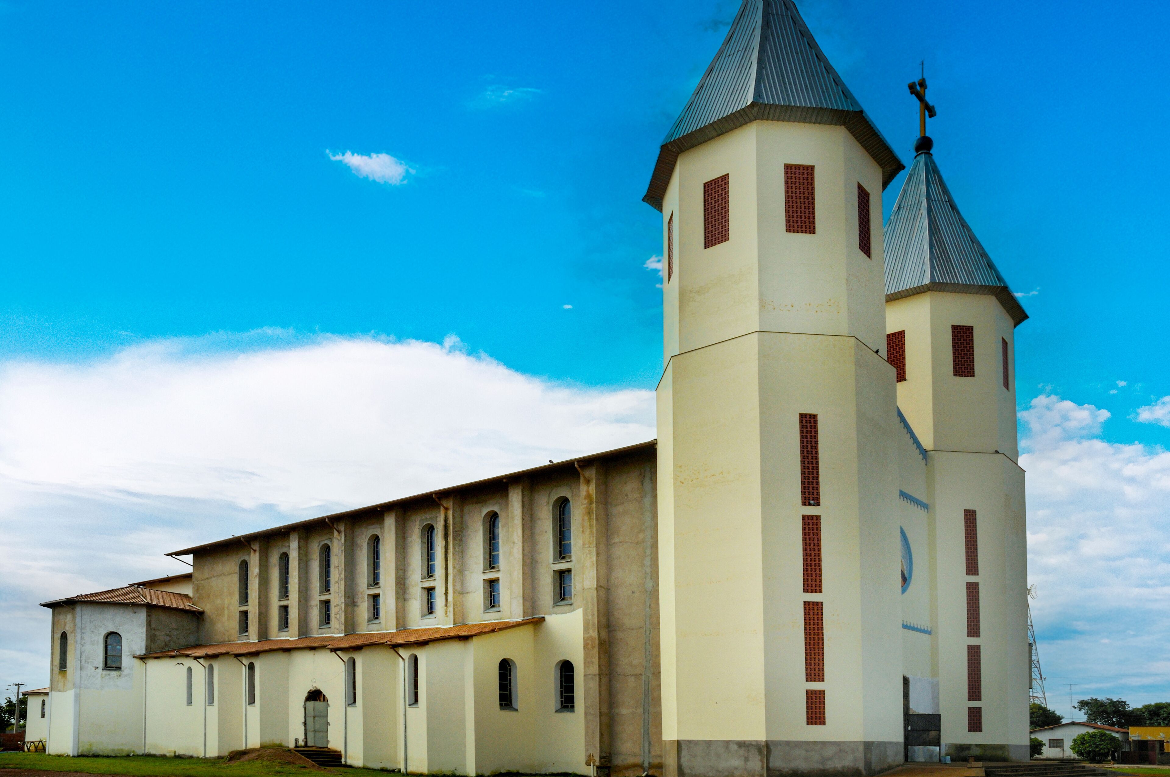 A large church with a bell tower and arched windows.