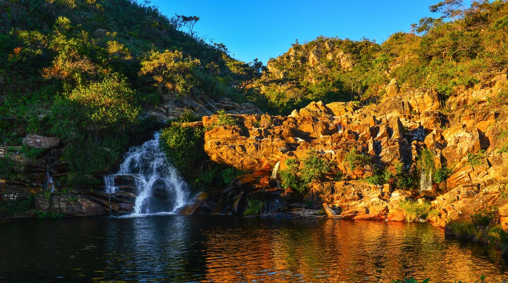 Sunset on a natural pool on the Serra Morena waterfall, Serra do Cipó, Minas Gerais State, Brazil