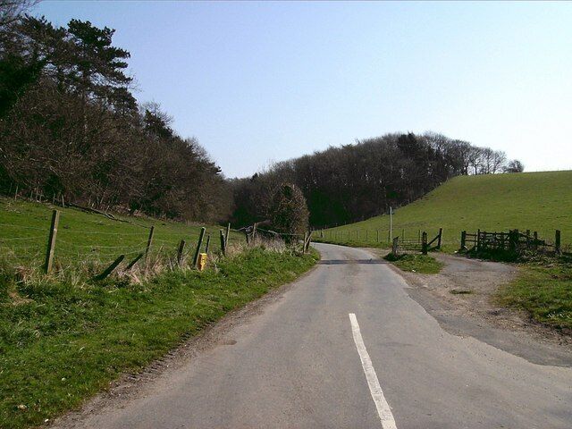 Ravendale valley west The western entrance, with the cattle grid and side road that pedestrians, cyclists and horses follow on the right.