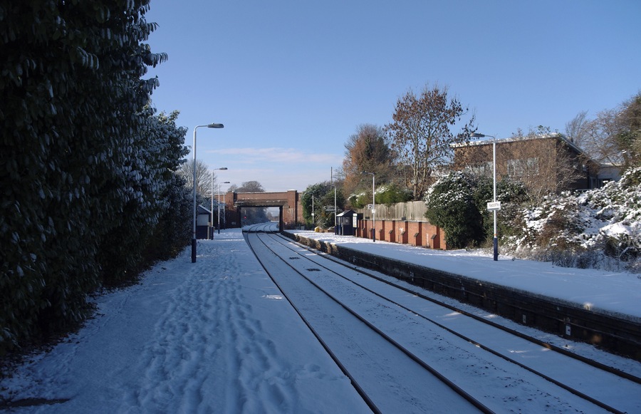 Radcliffe railway station in the snow - looking west along the westbound platform.