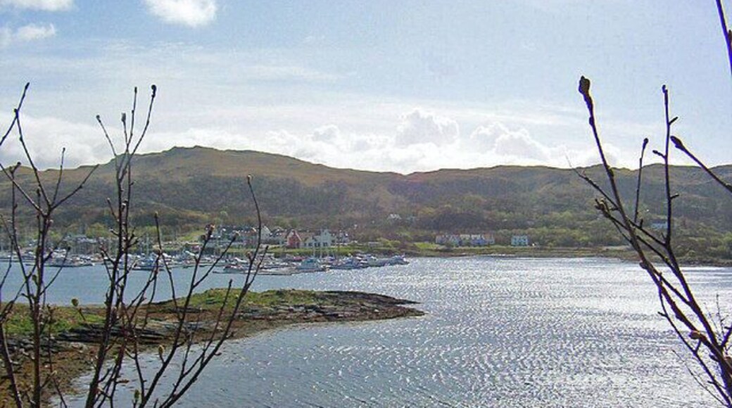 Craobh Haven from Eilean an Duin The harbour has been created by building causeways between some existing islands. The housing is a holiday village, complete with pub and shops.