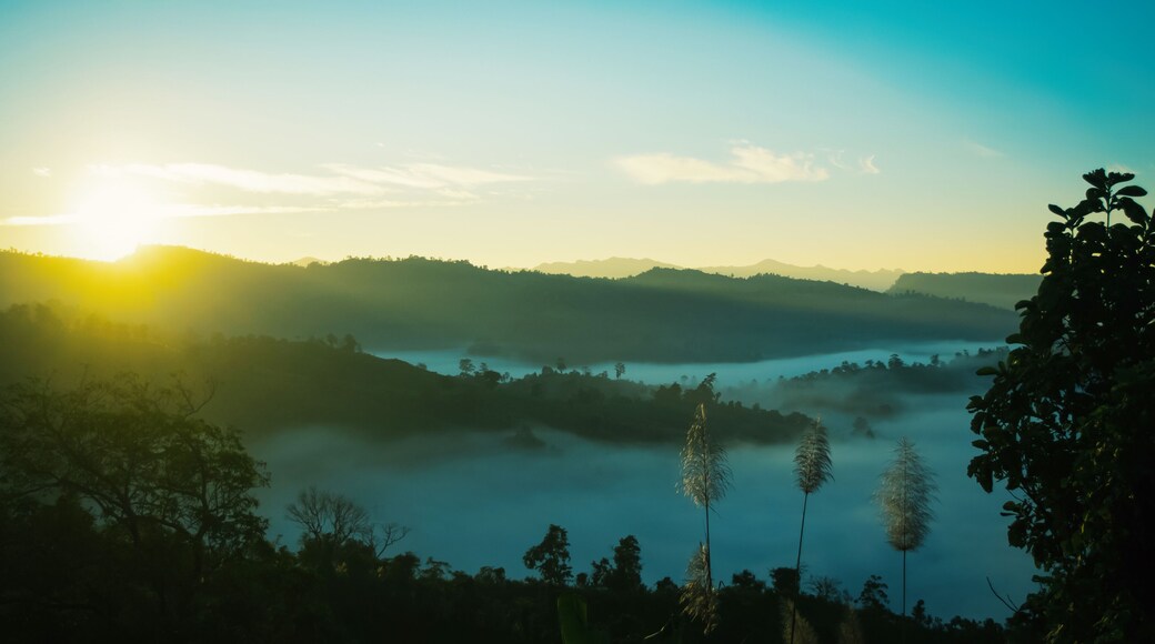 panorama of beautiful countryside of Bandarban, Bangladesh. sunny afternoon. wonderful springtime landscape in mountains. grassy field and rolling hills. rural scenery. Sajek, foggy morning sunrise