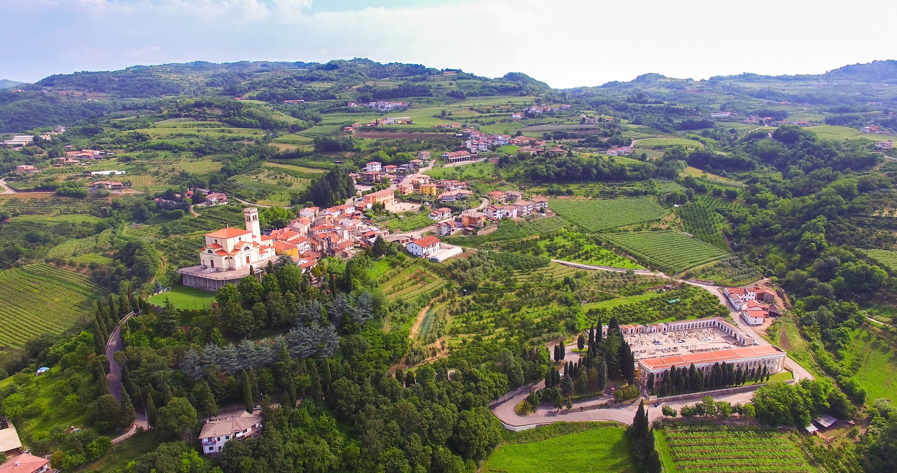 Aerial view of the center of San Giovanni Ilarione and St. Catherine's Church in Villa, Verona, Italy.
