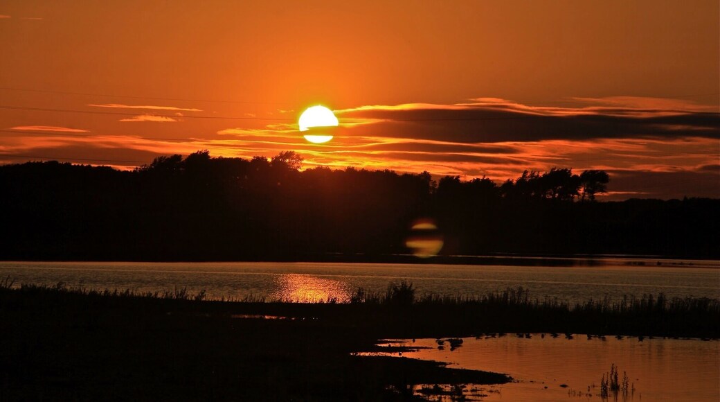To be able to sit at the water edge and enjoyed a grand sunset display by Mother's nature - Chase Water #hiking #hometown #reflections #nationalpark #travel #landscape #England #water #red