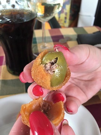 Oh my!....my tastebuds are doing the can can! Warm stuffed olives in breadcrumbs! #FoodieFinds