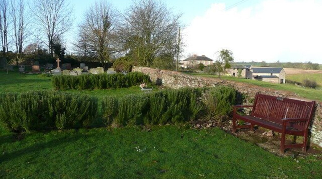 Part of Peterstow churchyard Areas of contemplation sectioned off with low rosemary hedges. The farm in the background is called The Flann.