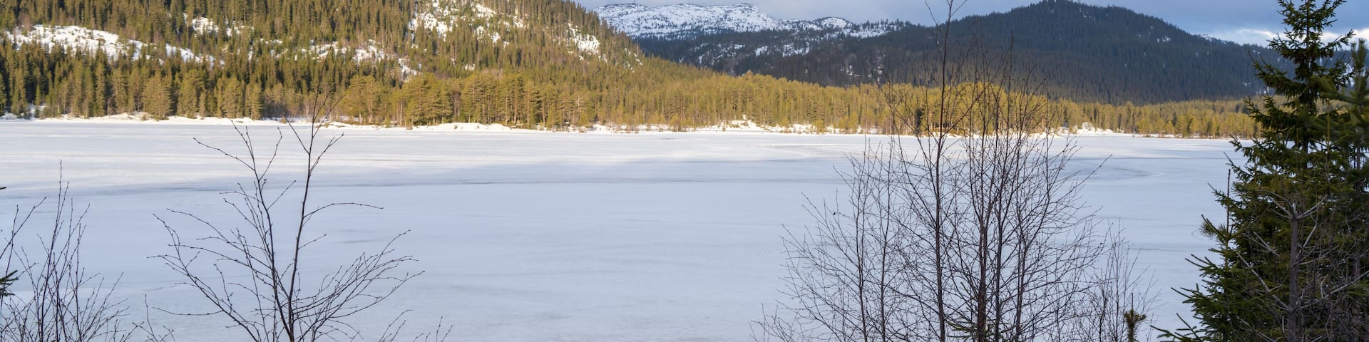 The frozen lake Morgedalstjønni near the village of Morgedal in Norway