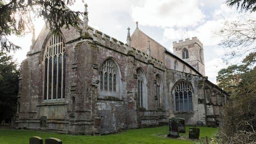 The present church is medieval and has changed little since about 1450 although there are remains of a church from 1135 which was destroyed by fire at the base of the tower. 1247 was when the foundation stone of the present church was laid and several original features of this time remain, the lower middle part of the tower, a winding staircase which would have provided access to the rood screen, a squint which would have originally been on an outside wall to allow the “unclean” and excommunicated to watch the consecration at the altar and several other features such as tomb stones. In the early 1300’s the church was altered with Sir Walter Friskney, a judge at the Court of the Exchequer in the reigns of Edward III and Richard II, being the benefactor. The nave was heightened by the addition of the clerestory and a third level was added to the tower. The chancel was also enlarged. The sedilia is late 14th century. The clerestory was decorated with wall paintings in 1320 and they can still be seen, although very faint (with the exception of The Last Supper, which was restored in 1978 at a cost of £1000). The north and south aisles were built in the 15th century and nave arches replaced the walls. The upper part of the tower now had a belfry added too plus the chancel and chapel screens were erected. The font is 15th century and originally had an ornate stone carved cover which was so heavy it had to be lifted by a pulley system.