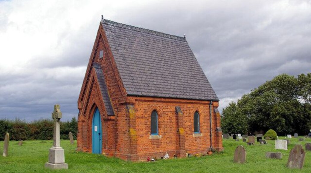 North Kelsey Cemetery. Picture shows cemetery chapel and war memorial cross (left foreground).