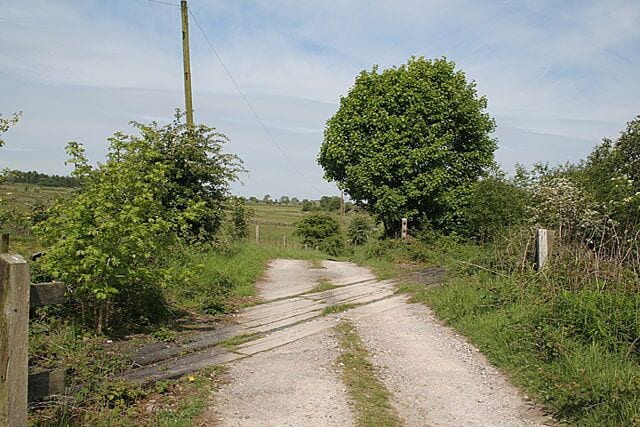 Railway crossing near Launds Farm On the disused railway line from Leek to Waterhouses.