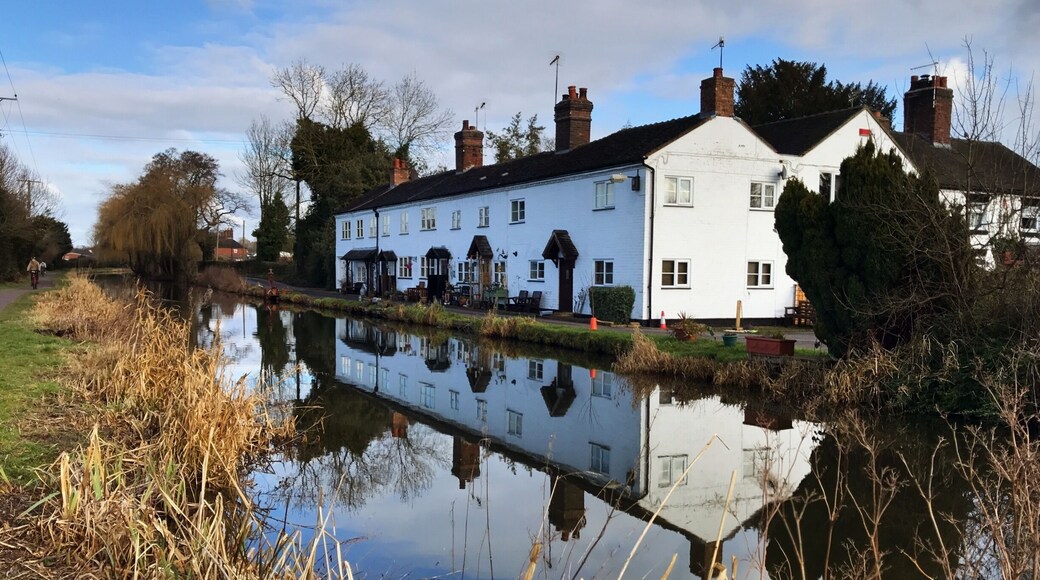 Cottage reflections in the Trent and Mersey Canal near Barlaston.