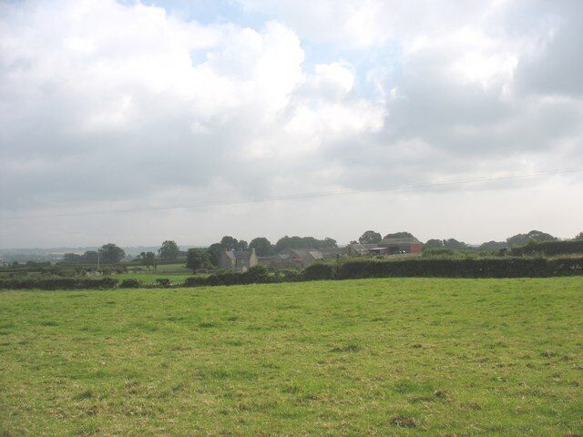 View across farmland towards Plas-bach