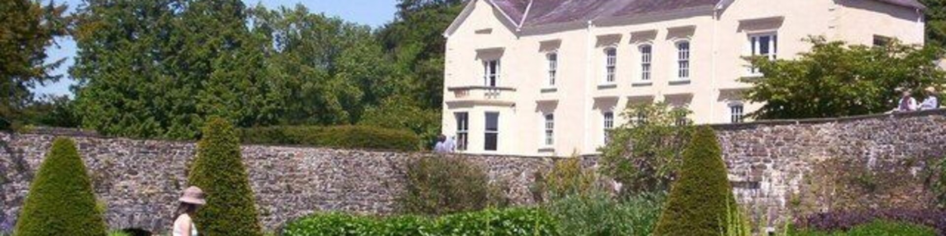 Aberglasney House Carmarthenshire Aberglasney House and Gardens situated in the picturesque Tywi Valley. Once owned by the Dyer family. John Dyer, famous Welsh poet (1699-1757) was born in the house. The house and gardens provided John with the inspiration to write one of his famous works, "The Country Walk". Published in 1726. 'See below the pleasant dome, The poets pride, The poets home.. See her woods, where echo talks, Her garden trim, Her terrace walks, Her wildernesses, fragrant brakes, Her gloomy bowers, and shining lakes,Keep ye Gods, this humble seat, for ever pleasant, private, neat.