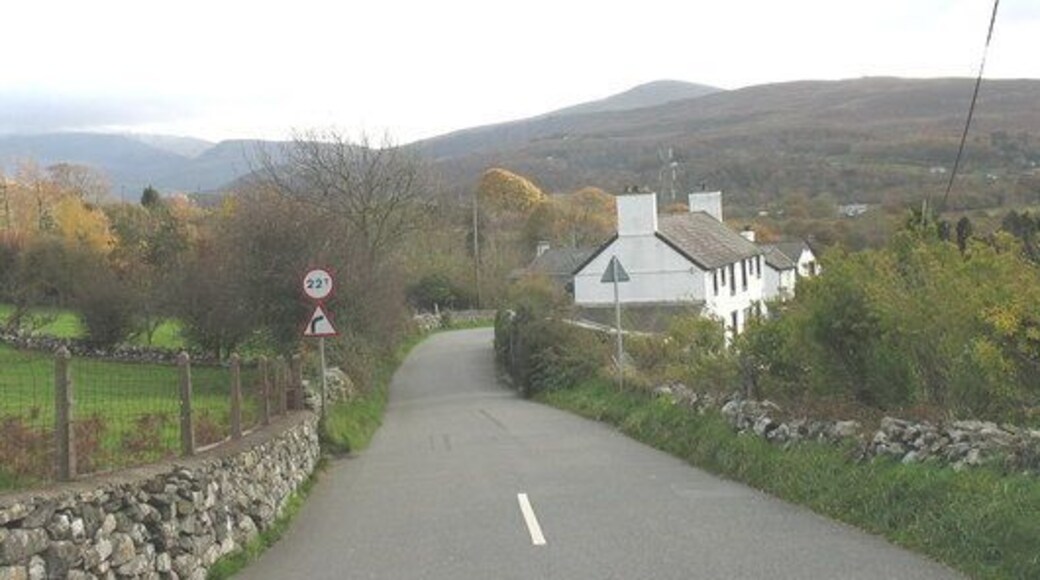 Pontrhythallt Hill The Deiniolen-Caernarfon road descends down hill towards the two humped back bridges on the valley floor up which lead to the village of Llanrug.