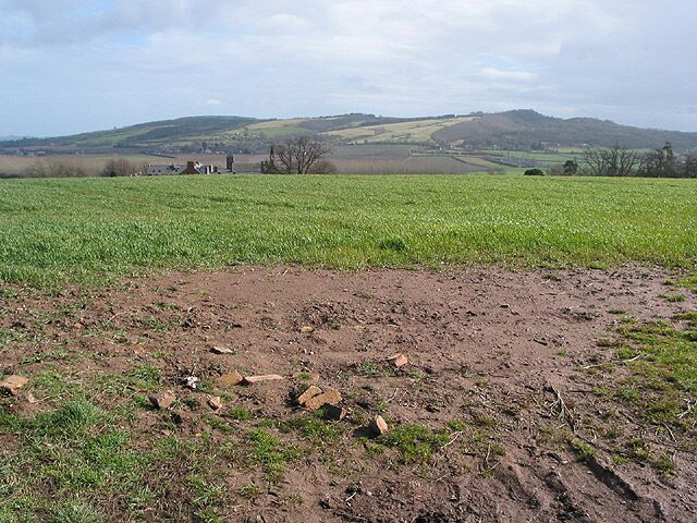 View over farmland at Bartestree The roof of the former Convent of Our Lady of Charity & Refuge can just be seen in the middle distance. Has been converted into luxury apartments. Backbury Hill is prominent in the distance.