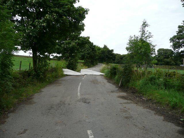Barriers close the road. See 921343
